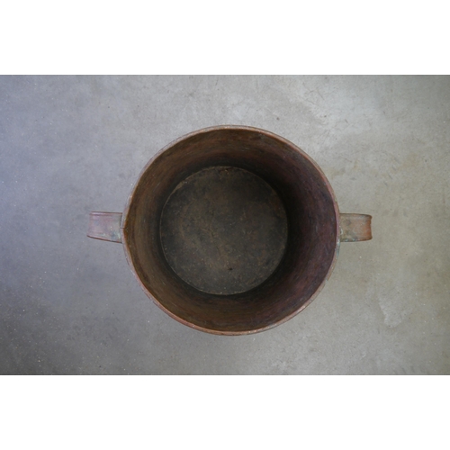 2004 - A twin handled copper bucket