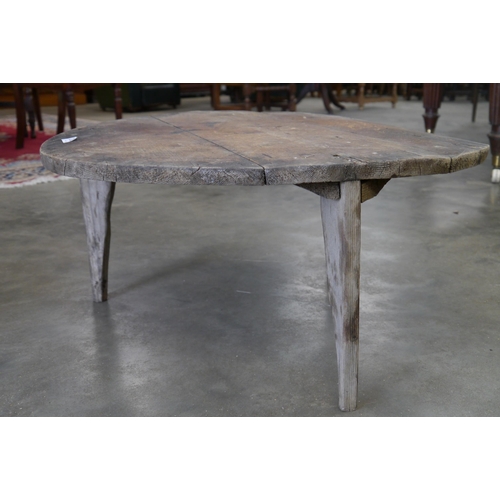 2005 - A rustic circular low table, 67cm diameter