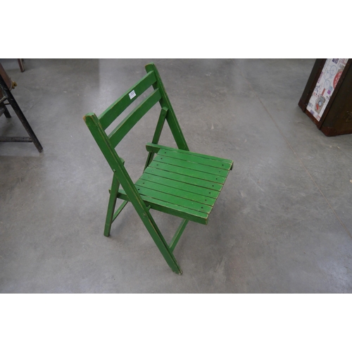 2023 - Three green painted beech folding chairs