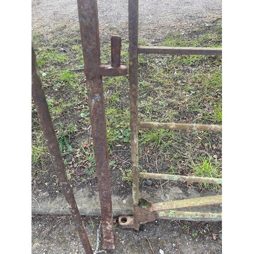 5001 - A wrought iron estate gate with posts, approx 324cm wide