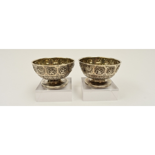 8015 - A pair of Victorian Hamilton & Inches, Edinburgh silver salts, decorated with signs of the zodiac an... 