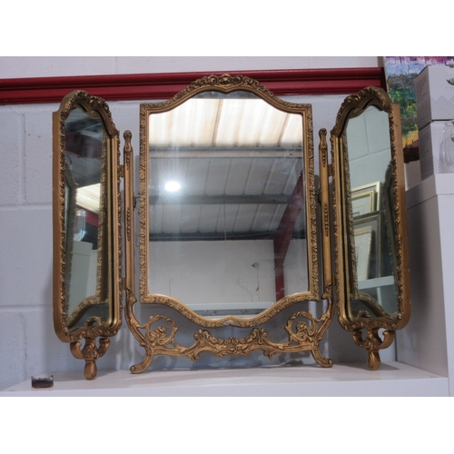 1073 - A gilt framed triptych free standing mirror