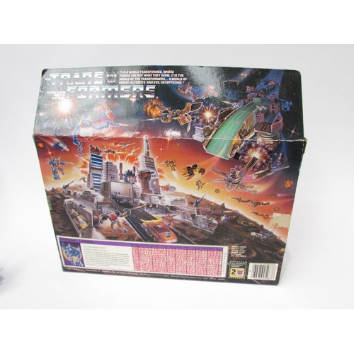 7028 - Hasbro Takara Transformers 1980s First Generation (G1) boxed Decepticon 'Scourge', in original box w... 