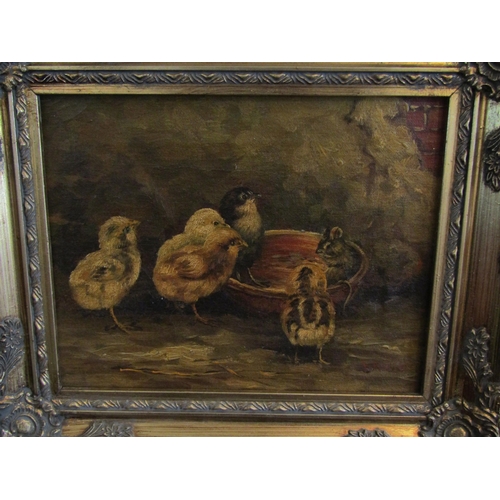 1063 - Two oleographs, chicks with mouse in a bowl and duckling looking at fly, after Edgar Hunt, both gilt... 
