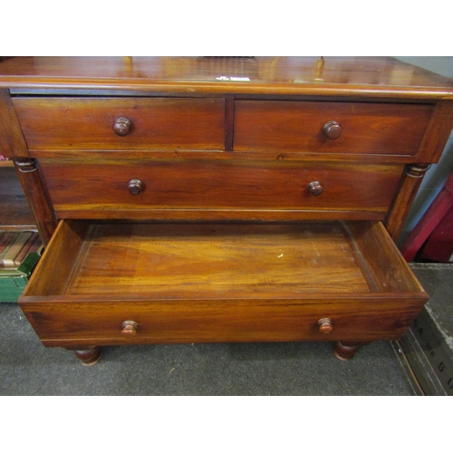 1074 - Two similar 20th Century hardwood two short over three chests of drawers flanked by turned spindles,... 