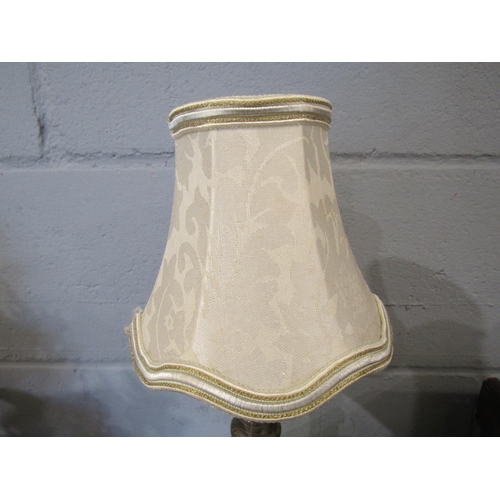 1085 - A turned and polished Cornish serpentine stone lamp in the form of a lighthouse on rocky outcrop, 38... 