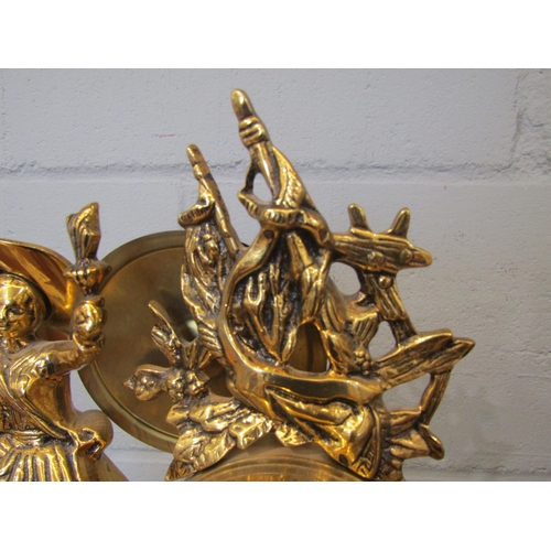 1086 - A Mozer brass mantel clock with a woman holding a flame, battery operated