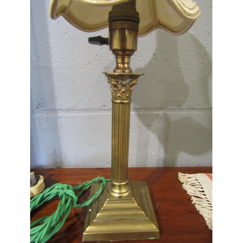 1087 - A mid-20th Century Corinthian column form table lamp of small proportions, 37cm overall height
