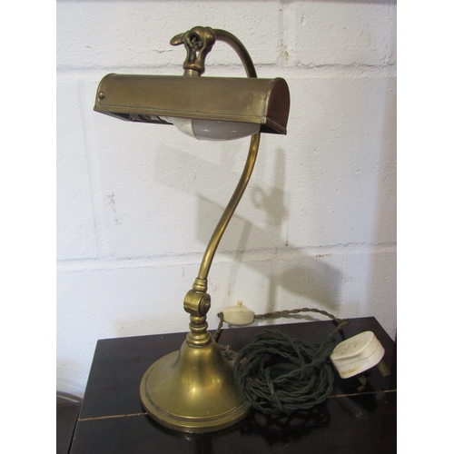 1089 - An early 20th Century brass desk lamp, 34cm height