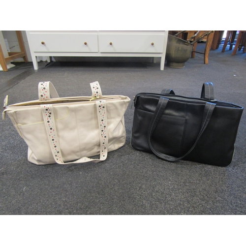 1115 - Two Radley shoulder bags in cream and black leather together with Radley and Bally dust bags