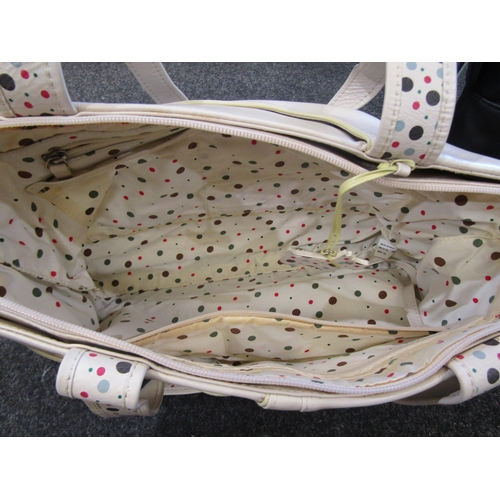 1115 - Two Radley shoulder bags in cream and black leather together with Radley and Bally dust bags