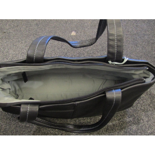 1115 - Two Radley shoulder bags in cream and black leather together with Radley and Bally dust bags