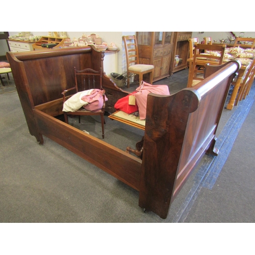 1117 - A late 19th/early 20th Century mahogany panelled sleigh bed, 194cm long x 112cm wide
