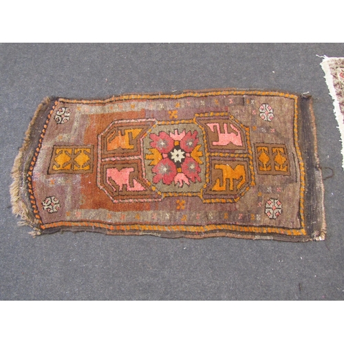 1120 - Four Eastern wool rugs, largest 100cm x 78cm, possibly prayer rugs, worn