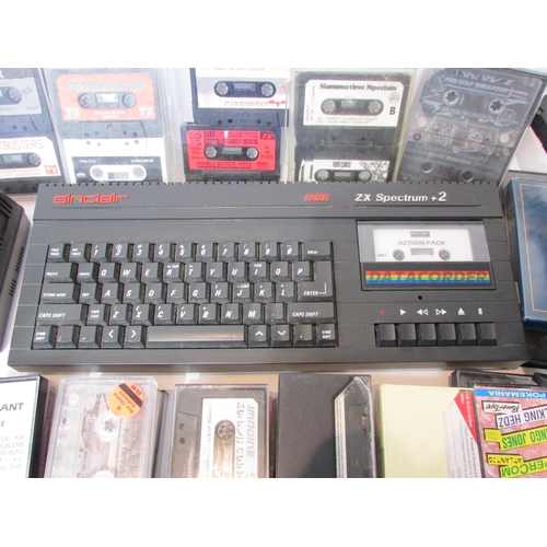 7007 - Amstrad Sinclair ZX Spectrum +2 personal home computer together with approximately 90 cassettes and ... 