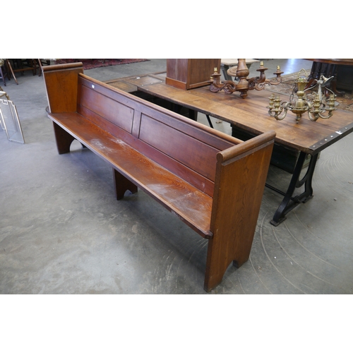 2008 - A pitch pine pew, 230cm long