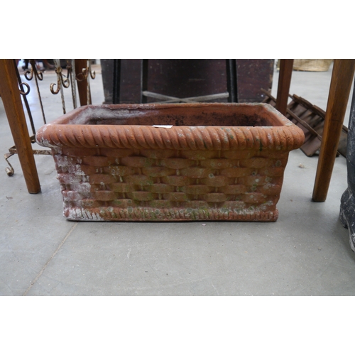 2015 - A terracotta planter with woven design
