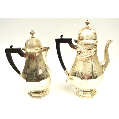 8008 - 18th Century style silver coffee pot of pedestal panelled baluster form, with domed lid and ebonised... 