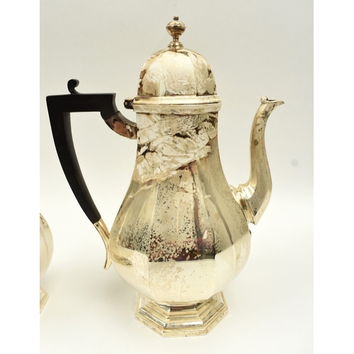 8008 - 18th Century style silver coffee pot of pedestal panelled baluster form, with domed lid and ebonised... 