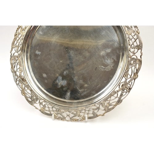 8031 - Weir & Sons George VI Irish silver circular salver, with pierced Celtic design border of interlaced ... 