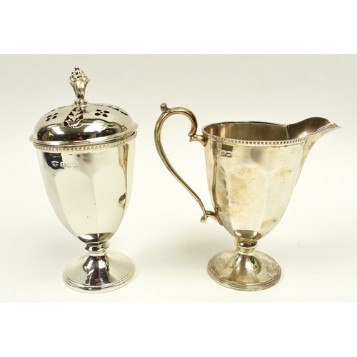8038 - A George V Mappin & Webb silver sugar castor and cream jug, each of pedestal panelled conical form. ... 