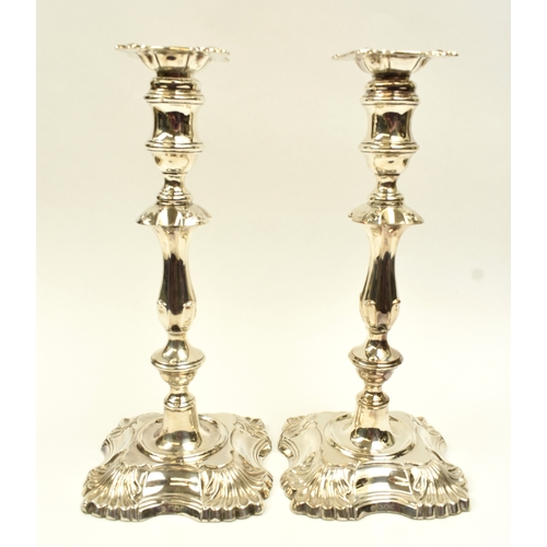 8002 - A pair of William Hutton & Sons Ltd large silver weighted based candlesticks of classic design, Lond... 