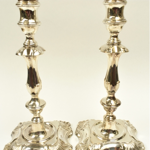 8002 - A pair of William Hutton & Sons Ltd large silver weighted based candlesticks of classic design, Lond... 
