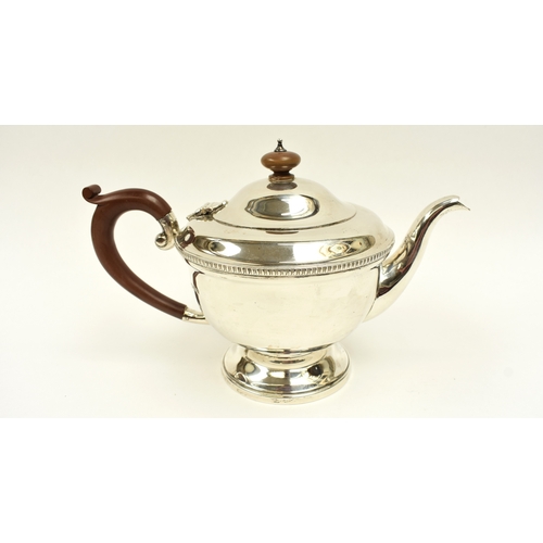 8034 - A Jay Richard Attenborough Co Ltd silver teapot with treen handle, Chester 1933, 446g