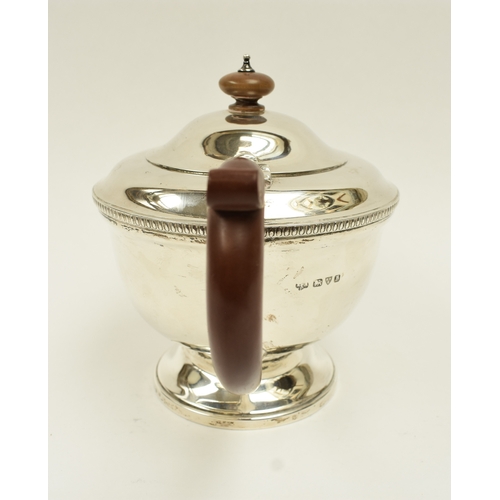 8034 - A Jay Richard Attenborough Co Ltd silver teapot with treen handle, Chester 1933, 446g