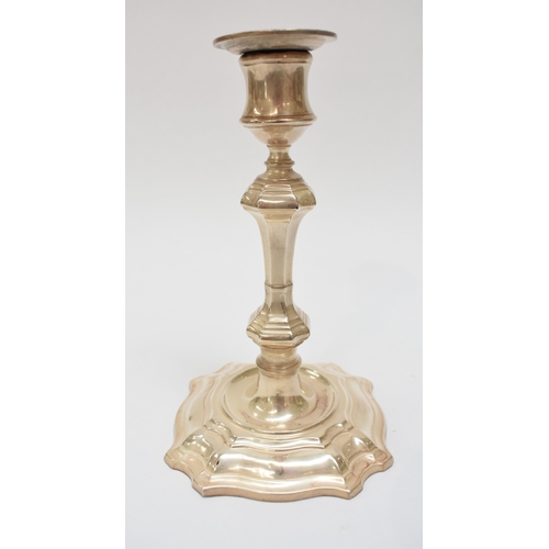 8010 - A pair of William Hutton & Sons Ltd London silver candlesticks. Weighted base, Marks worn, 19cm tall