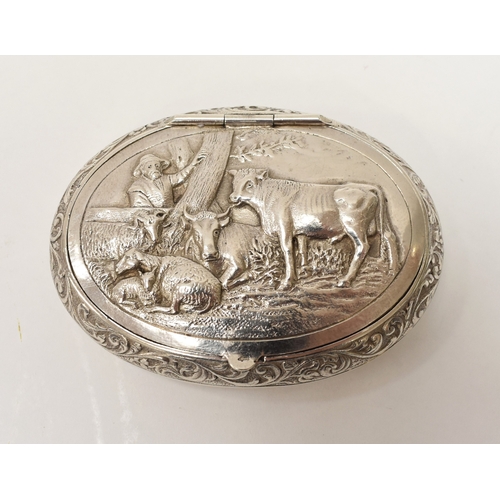 8044A - A Netherlands silver snuff tobacco box, the lid decorated with cows and sheep, oval form, 8cm long x... 