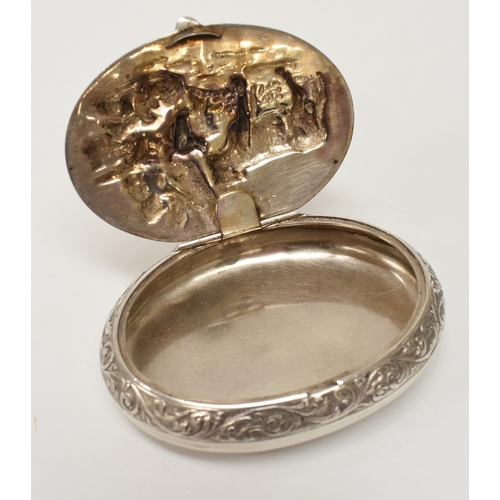 8044A - A Netherlands silver snuff tobacco box, the lid decorated with cows and sheep, oval form, 8cm long x... 