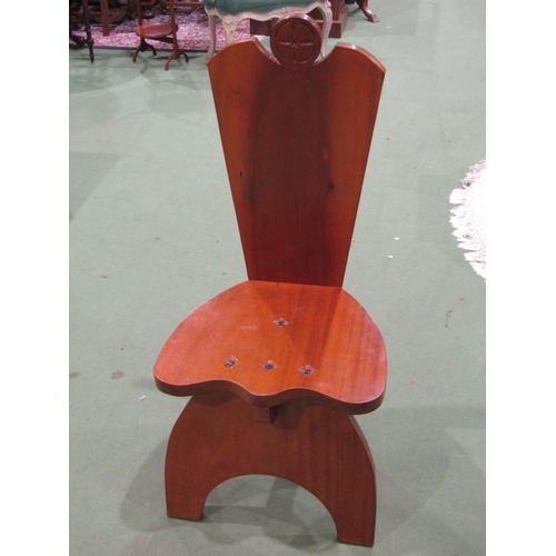 4039 - An Arts & Crafts style mahogany chair with iron bolt decoration