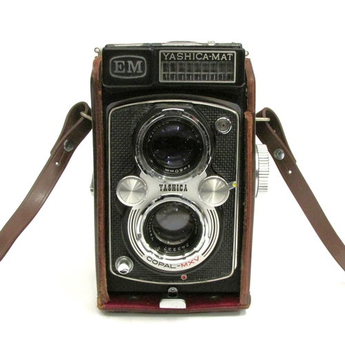 7017 - Yashica-Mat EM TLR camera, with Yashinon f/3.2 80mm and Yashinon f/3.5 80mm twin lenses, in leather ... 