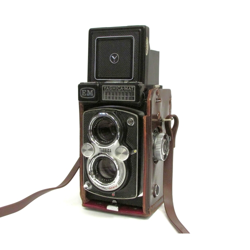 7017 - Yashica-Mat EM TLR camera, with Yashinon f/3.2 80mm and Yashinon f/3.5 80mm twin lenses, in leather ... 