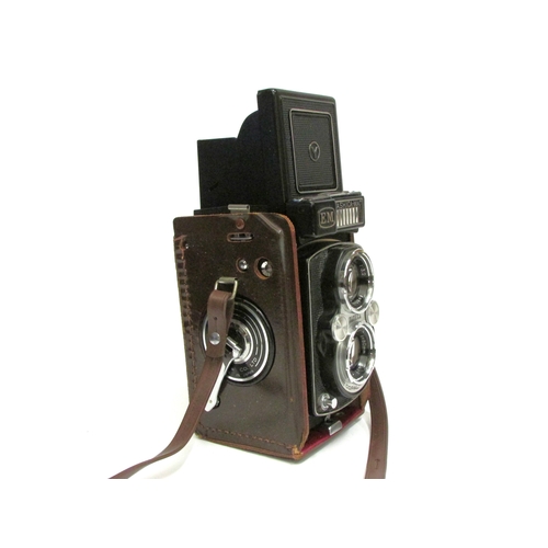 7017 - Yashica-Mat EM TLR camera, with Yashinon f/3.2 80mm and Yashinon f/3.5 80mm twin lenses, in leather ... 