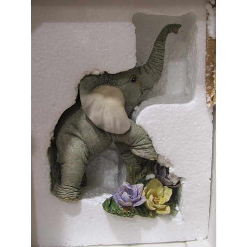 4025 - Four 'Tuskers' resin elephants and Five 'Henry' resin elephants, boxed (9)