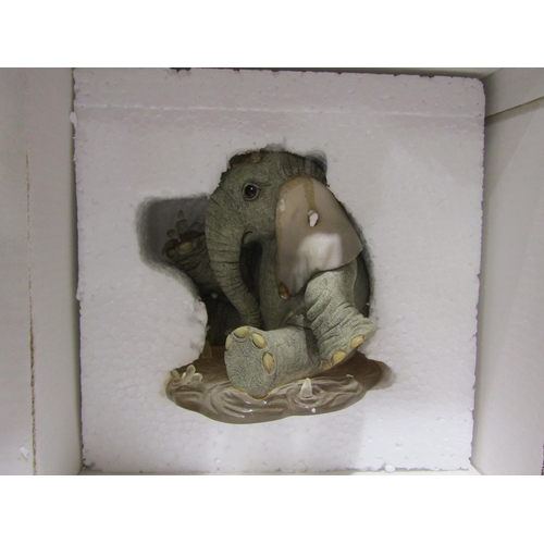 4025 - Four 'Tuskers' resin elephants and Five 'Henry' resin elephants, boxed (9)