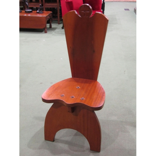 4039 - An Arts & Crafts style mahogany chair with iron bolt decoration