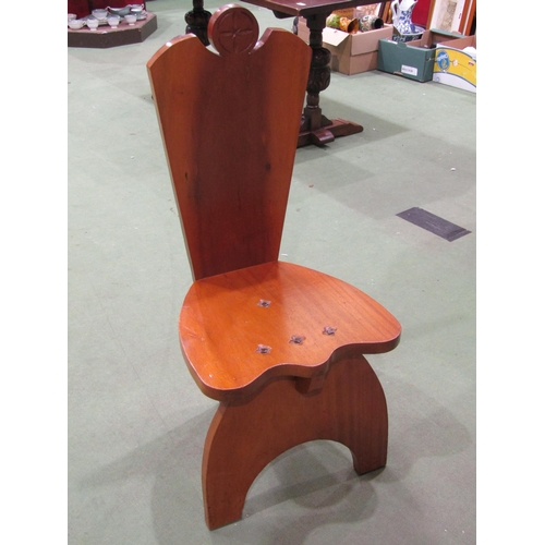 4039 - An Arts & Crafts style mahogany chair with iron bolt decoration