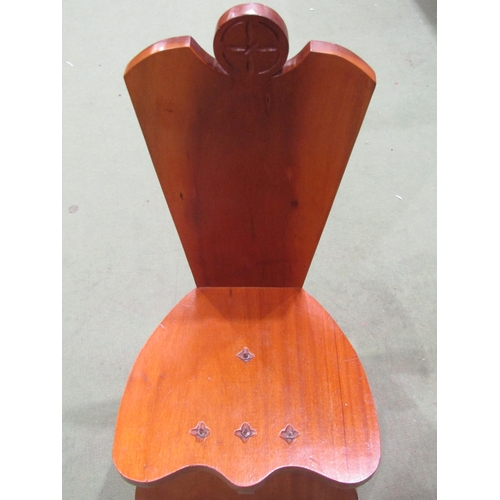 4039 - An Arts & Crafts style mahogany chair with iron bolt decoration
