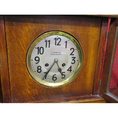 4047 - An H.Samuel of Manchester oak cased Grandmother clock with key, 158cm tall