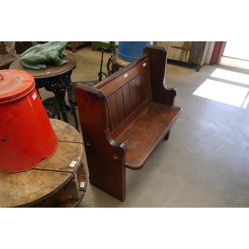 2001 - A stained pine church pew converted into a settle, 70cm wide