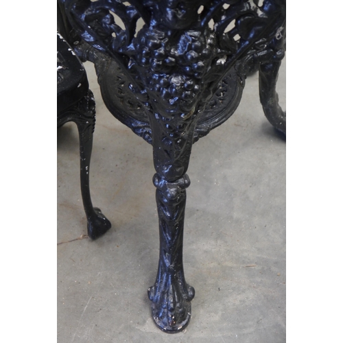 2009 - A cast iron based pub table and four alloy garden chairs