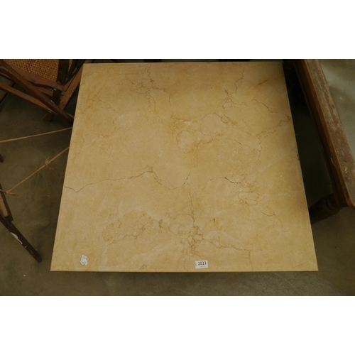 2023 - A marble toppped table on chunky pine base