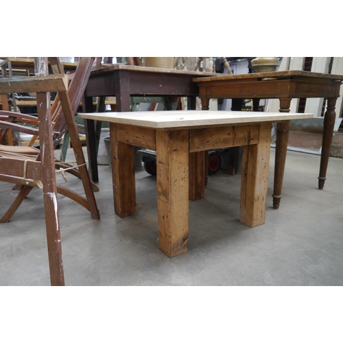 2023 - A marble toppped table on chunky pine base