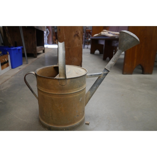 2029 - A galvanised watering can