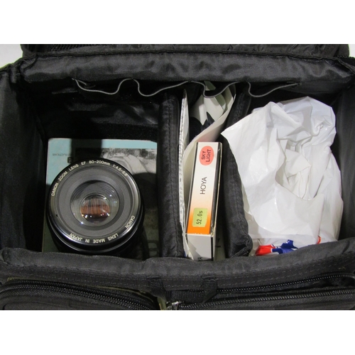 4297 - A Canon EOS 700 digital camera together with additional lenses, in carry case