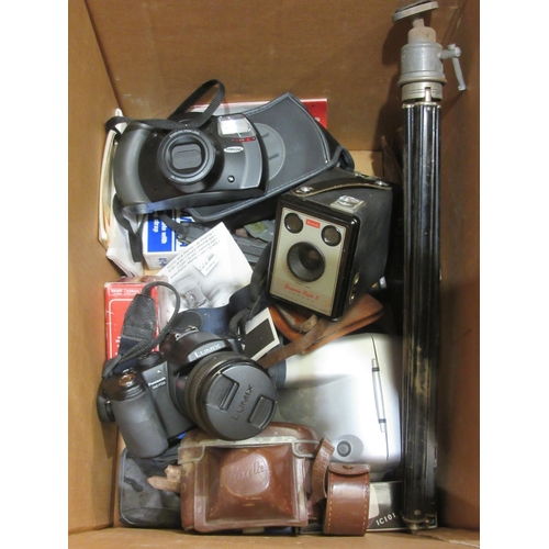 4438 - A box of cameras and related accessories including Kodak Brownie Flash II, Panasonic DMC-FZ50 camera... 
