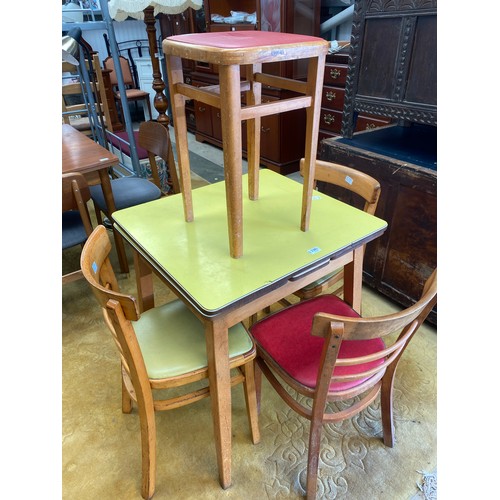 2381 - A mid century formica-top draw-leaf kitchen table together with three chairs and a stool (5)